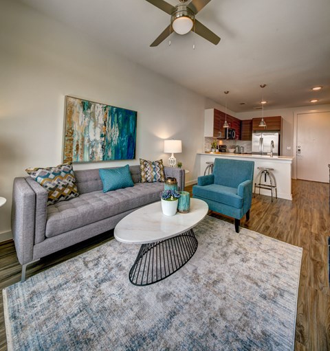 a living room with a couch and a chair